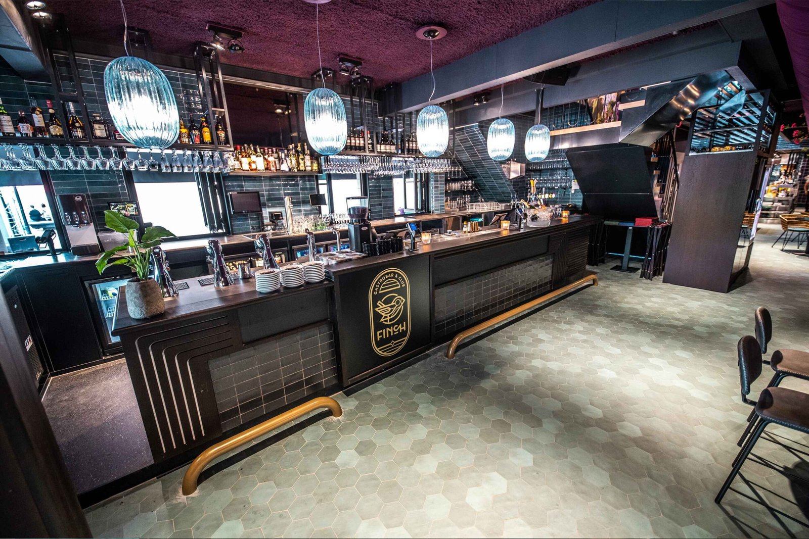 Commercial bar design showing stainless steel underbar workstation at a professional venue