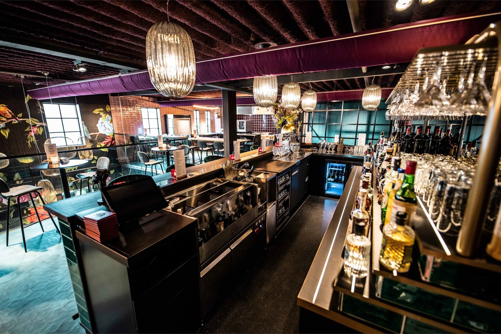 Restaurant bar design with integrated Kobayashi stainless steel cocktail station and drink rail
