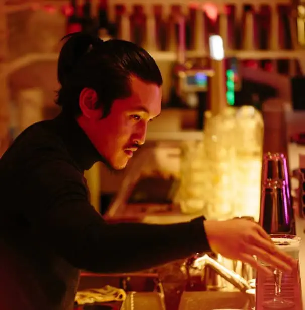 Yu Jiang behind the bar