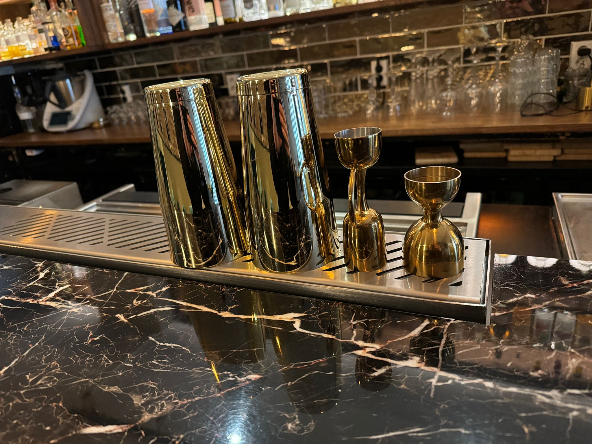 Brushed stainless steel drink rail detail