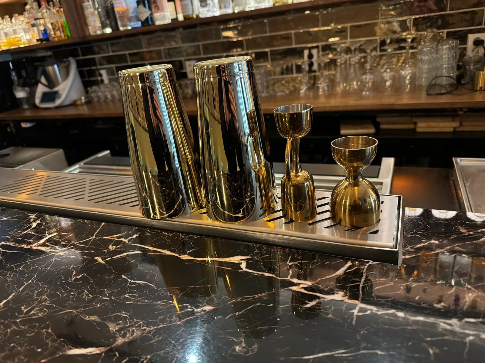 Brushed stainless steel drink rail detail